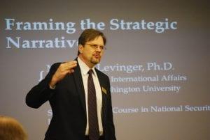 Matthew Levinger presenting in front of a group.