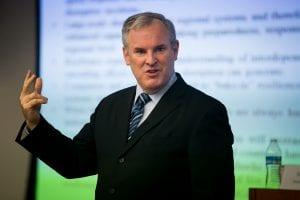 Stephen Flynn delivering a presentation.